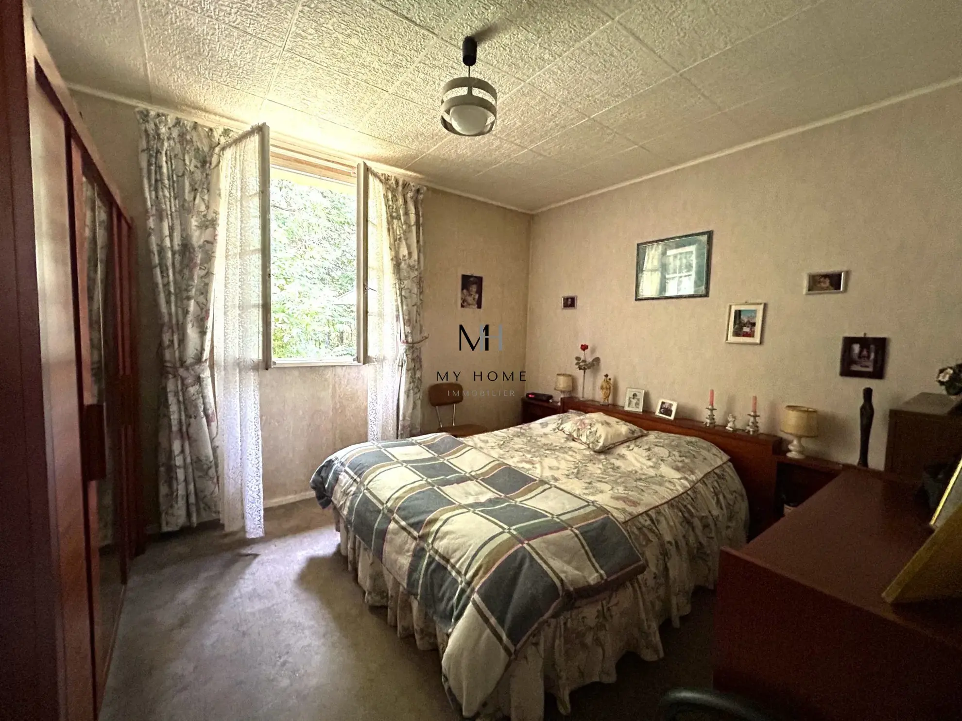 Maison de plain-pied à rénover à Lonrai - 3 chambres, garage, terrain clos 