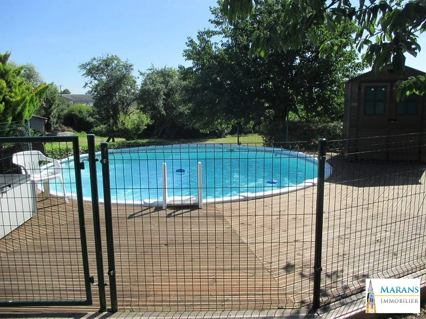 Piscine hors sol sécurisée Vente d’un ensemble immobilier de deux maisons avec piscine à Sableau 