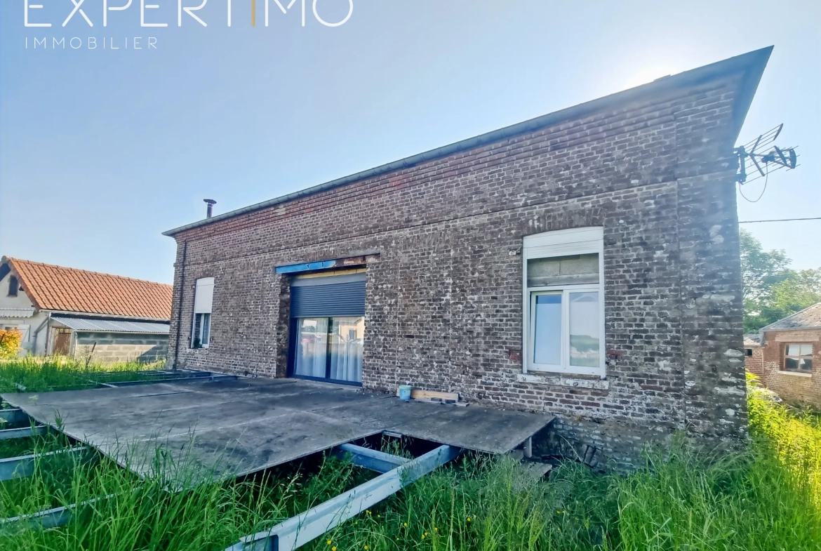 Maison à vendre à Woincourt - 110 m² avec 3 chambres et terrain clos de 2229 m² 