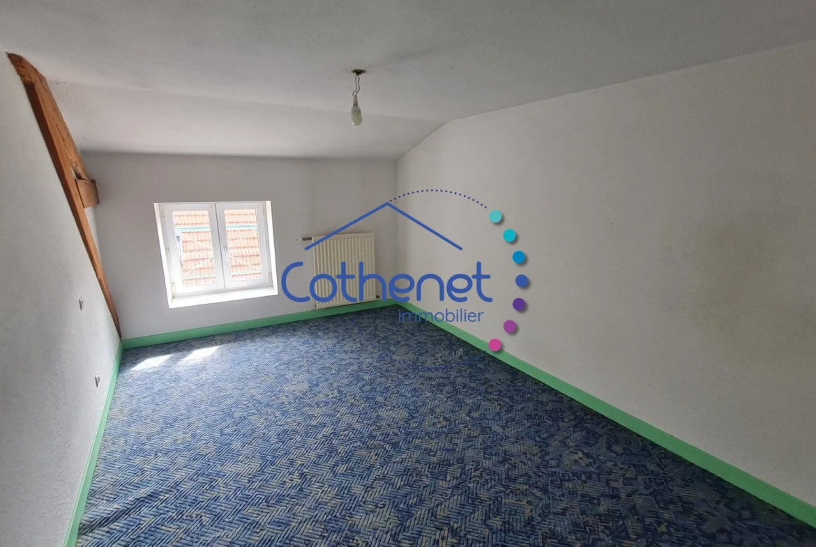 A vendre maison de ville à Cours-la-Ville avec espace commercial modulable 
