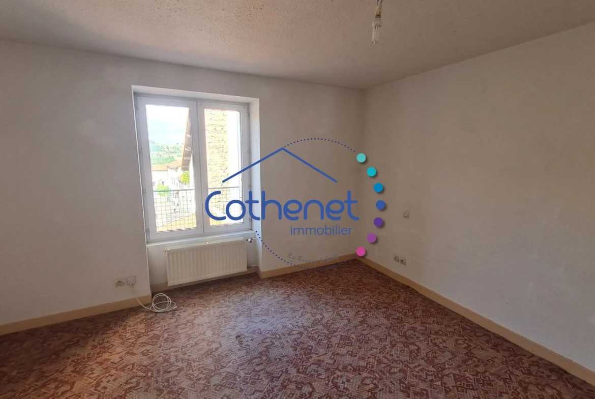 A vendre maison de ville à Cours-la-Ville avec espace commercial modulable 