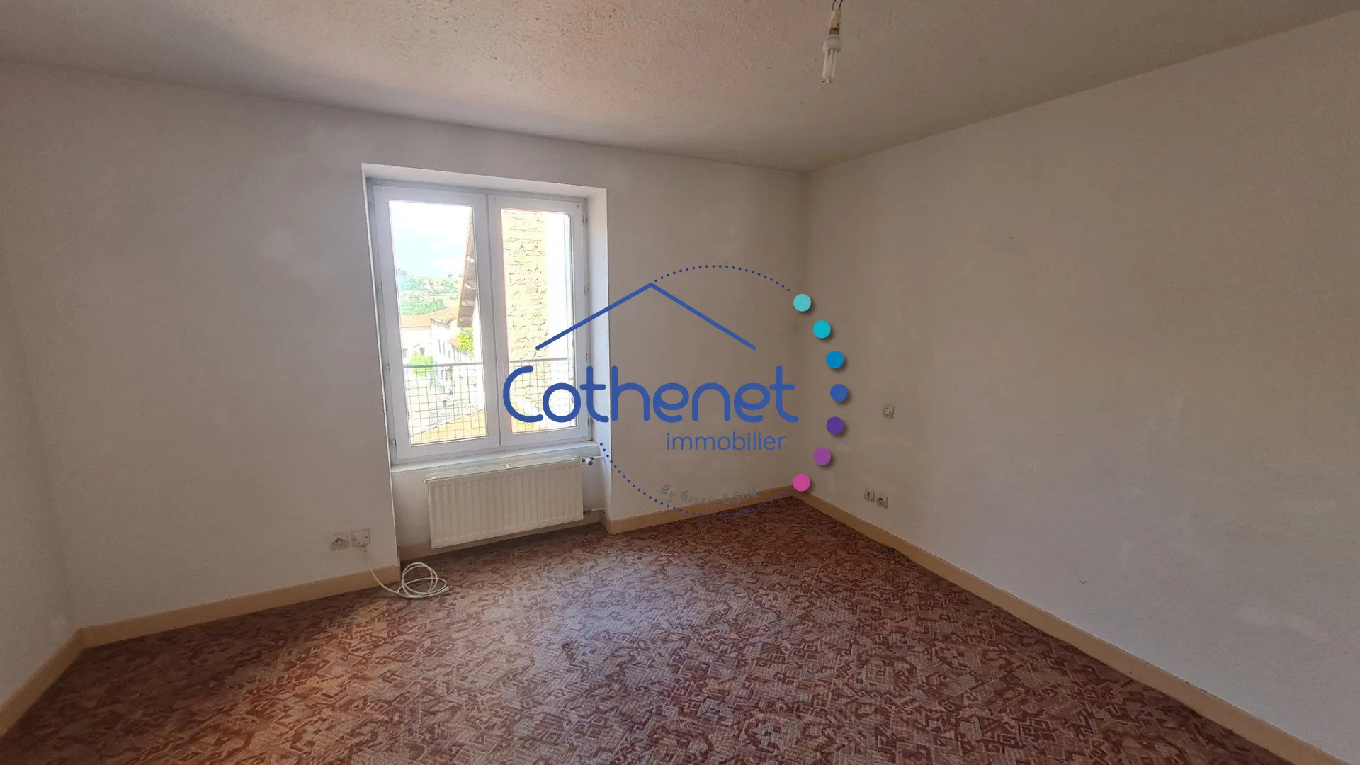 A vendre maison de ville à Cours-la-Ville avec espace commercial modulable 