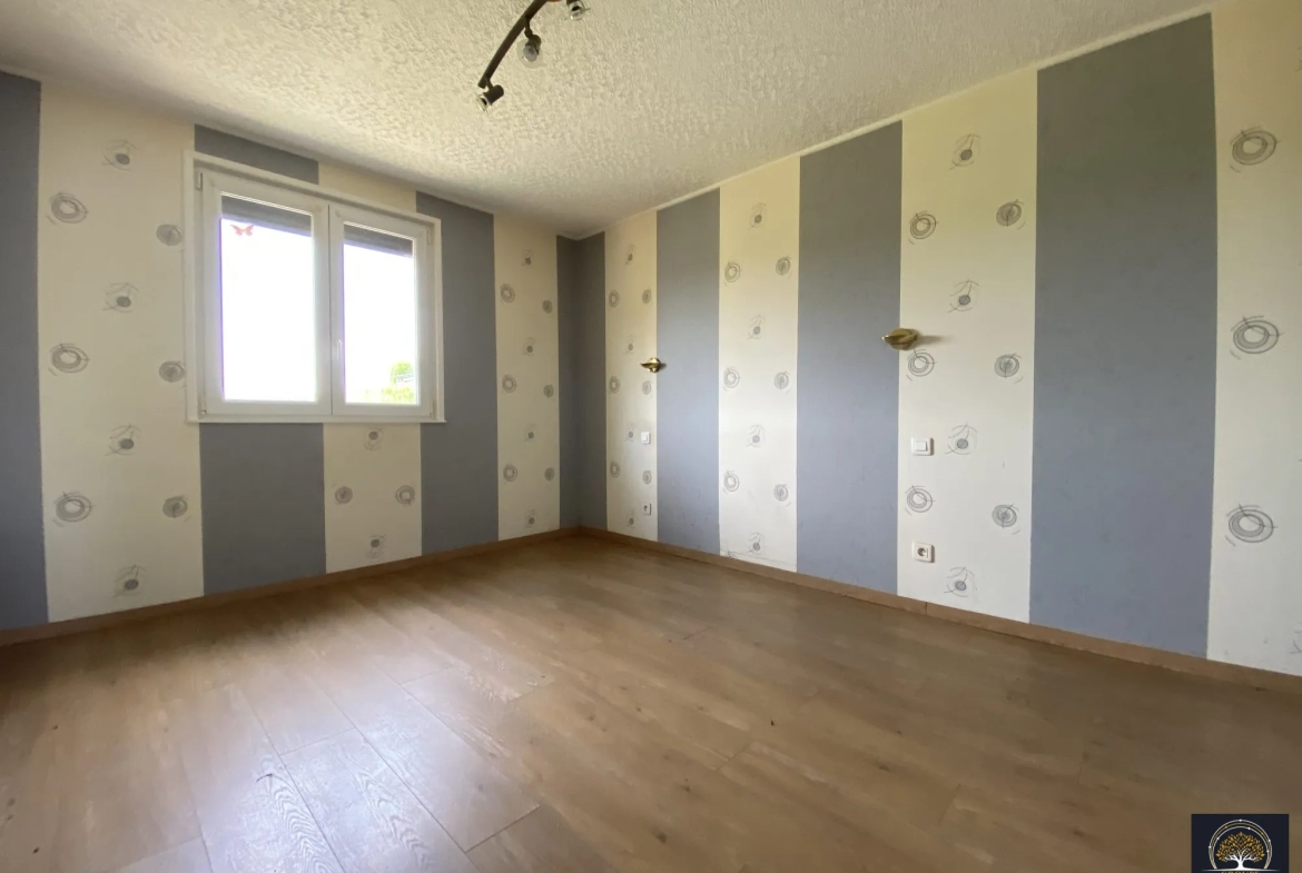Maison individuelle de plain-pied à Croisilles avec terrasse et garage 