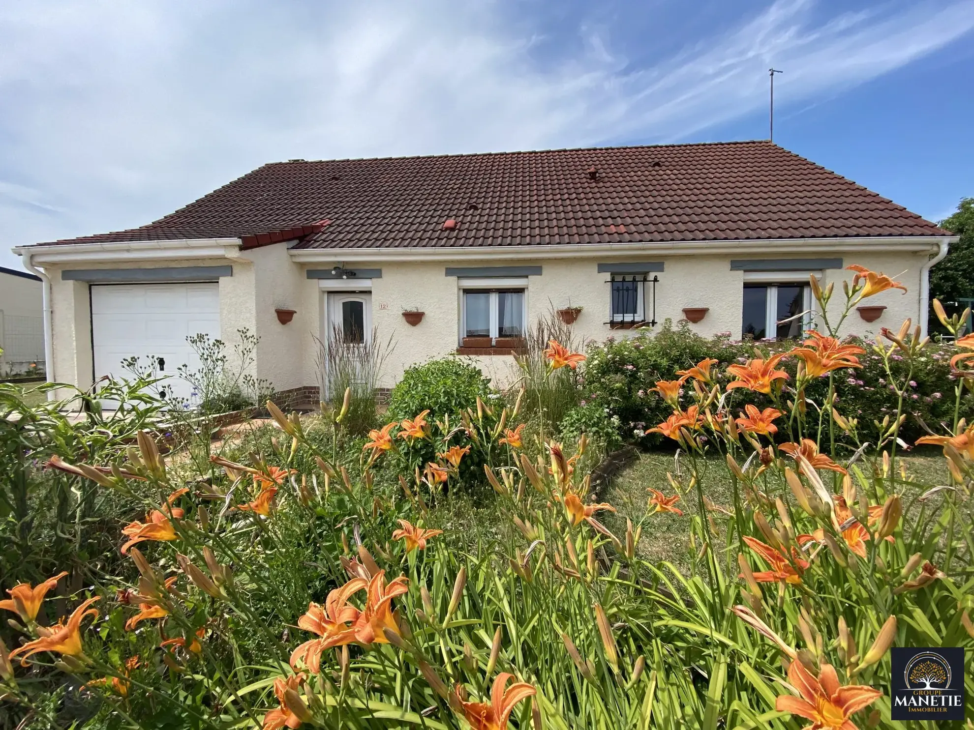 Maison individuelle de plain-pied à Croisilles avec terrasse et garage 