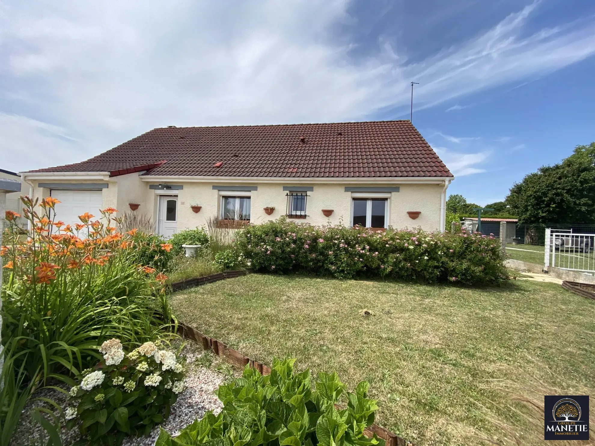 Maison individuelle de plain-pied à Croisilles avec terrasse et garage 