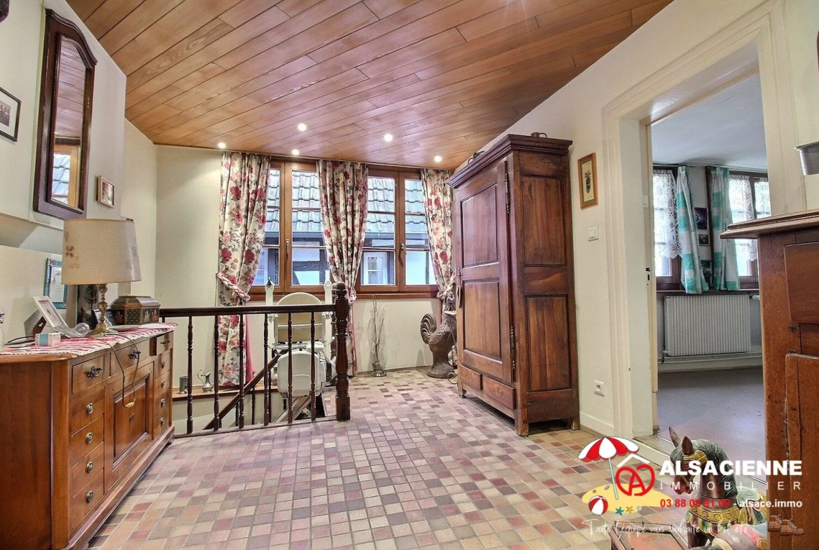 Spacieux appartement avec cave et garage à Barr, potentiel de rénovation 