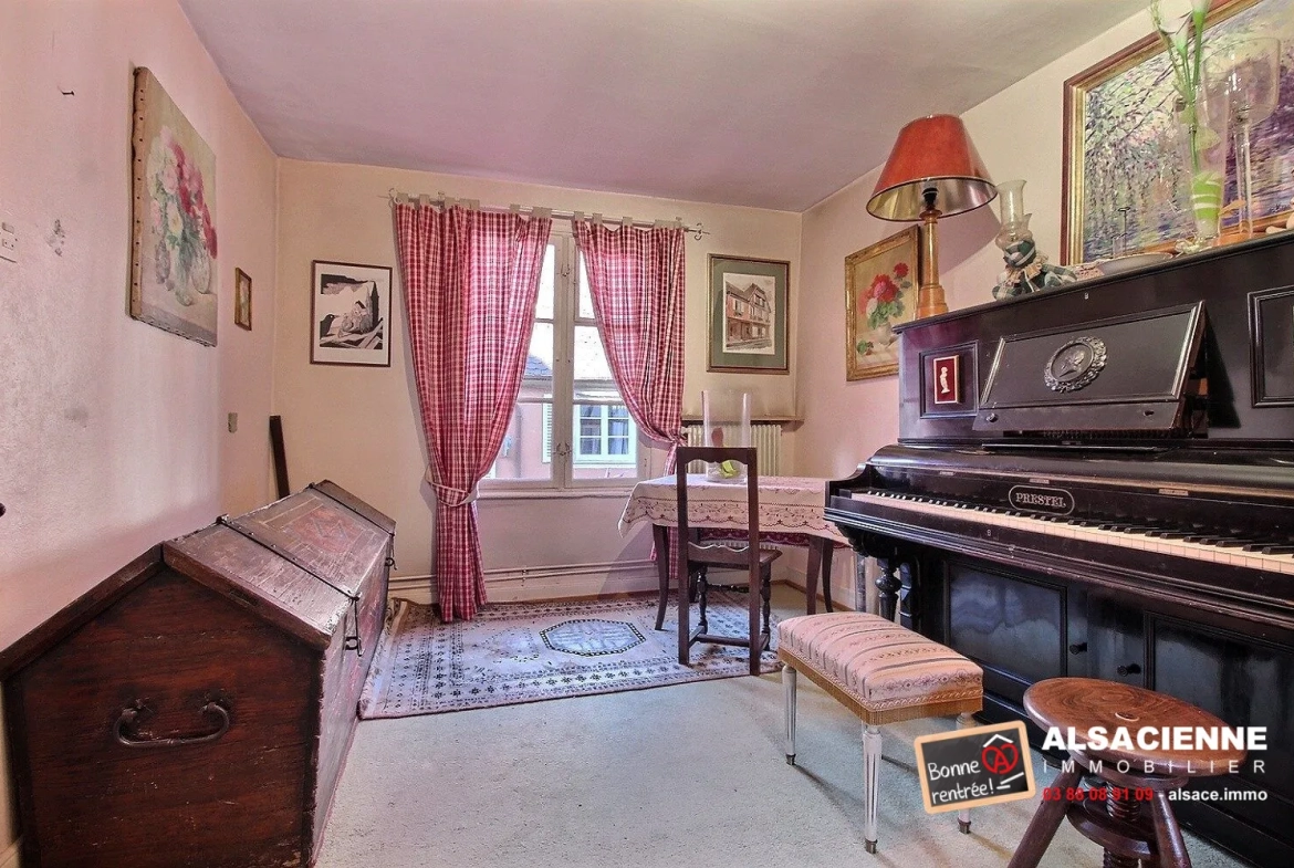 Spacieux appartement avec cave et garage à Barr, potentiel de rénovation 