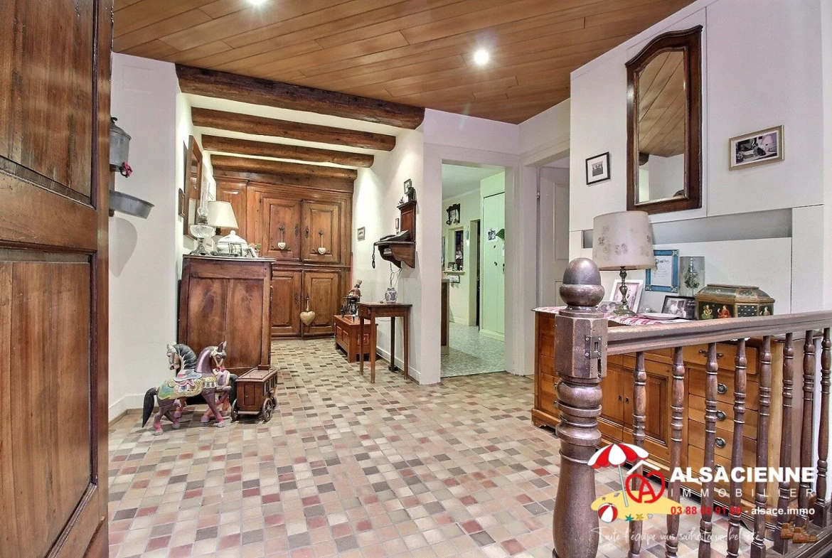 Spacieux appartement avec cave et garage à Barr, potentiel de rénovation 