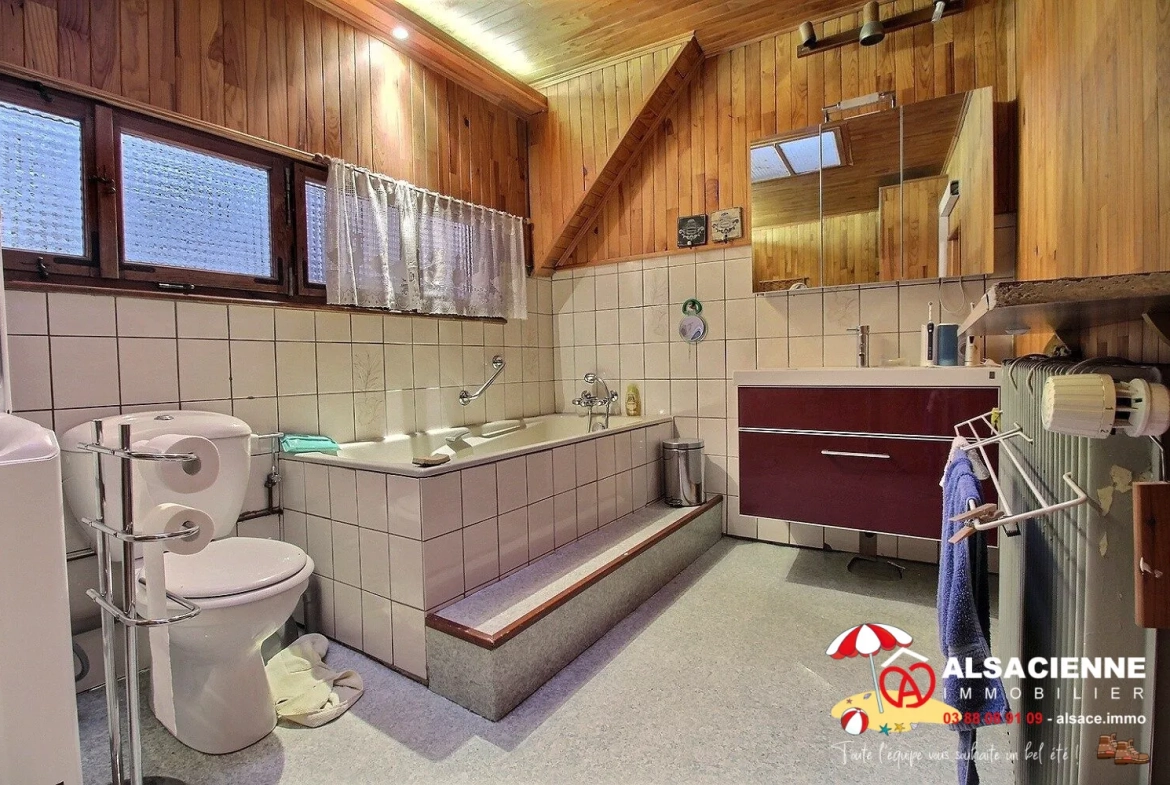 Spacieux appartement avec cave et garage à Barr, potentiel de rénovation 