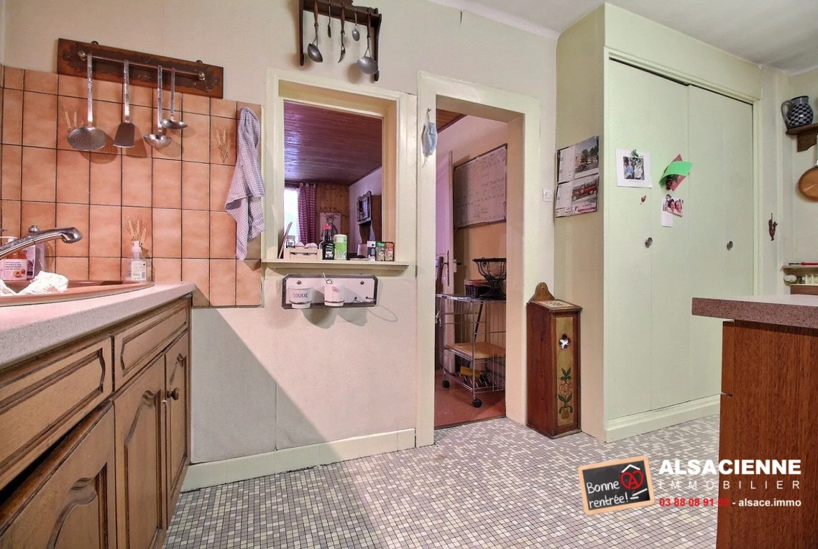 Spacieux appartement avec cave et garage à Barr, potentiel de rénovation 