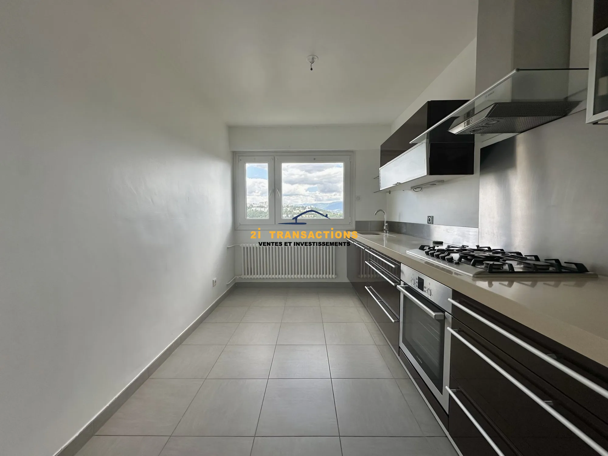 Appartement T4 lumineux avec vue dégagée et deux balcons à Saint-Priest-en-Jarez 