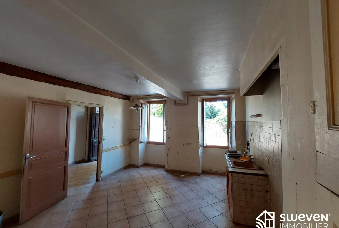 Maison ancienne à rénover avec jardin à Couladère - Opportunité d'investissement 
