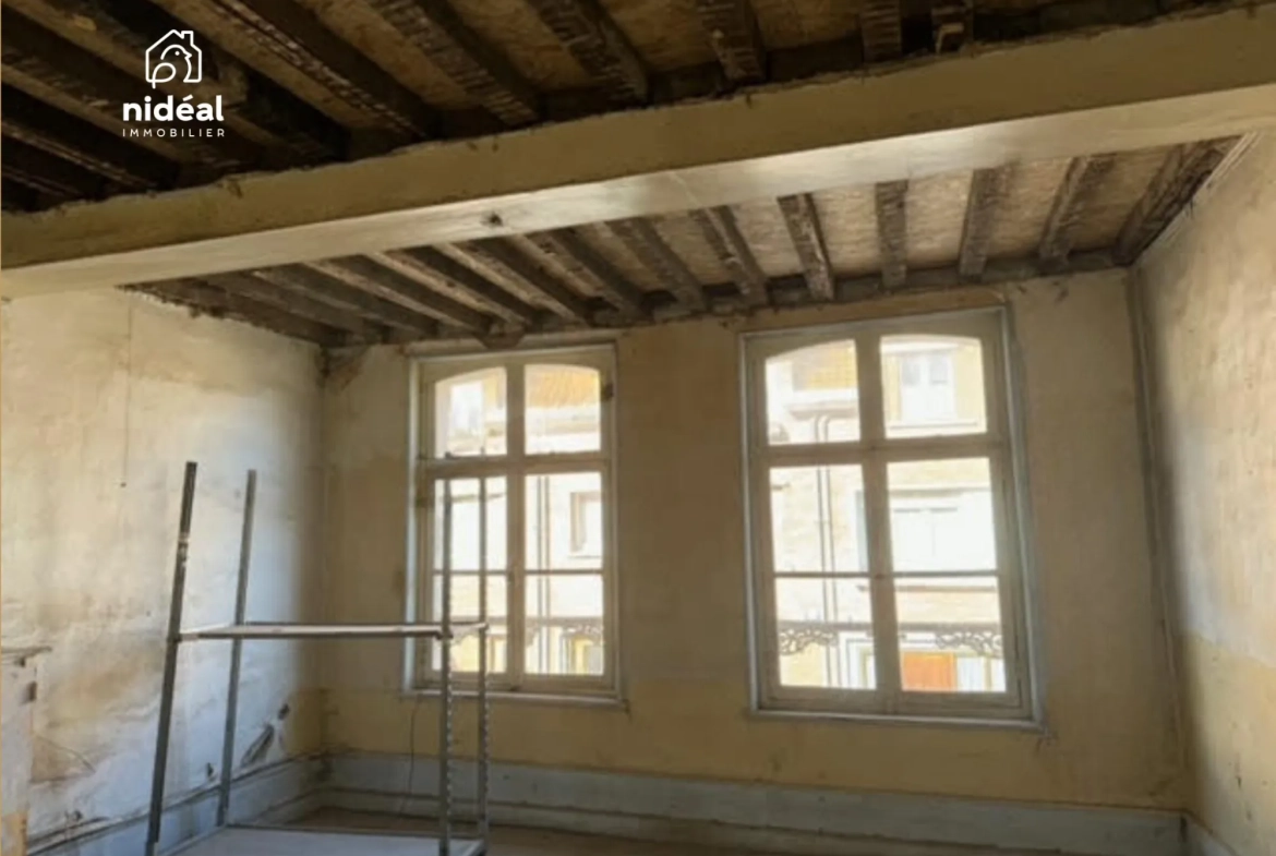 Investissez dans un immeuble de rapport à Le Quesnoy avec 5 logements et fort potentiel locatif 