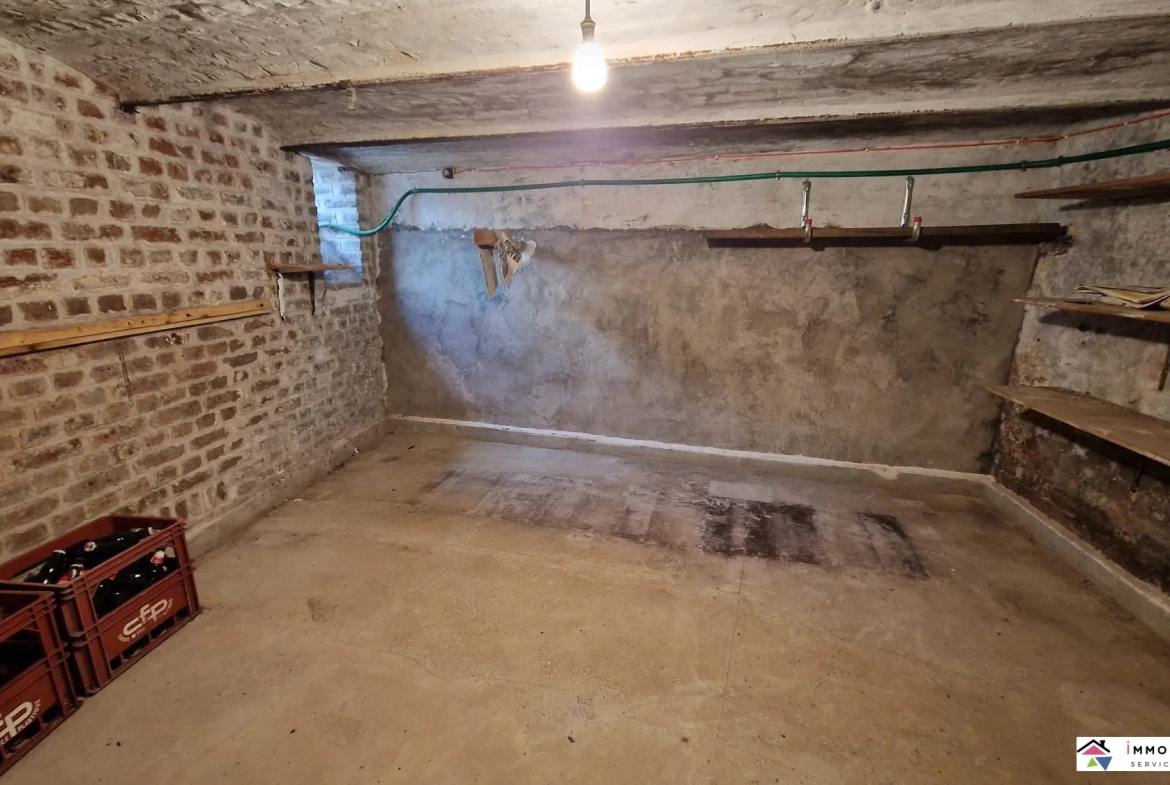 Maison de ville à rénover avec cour et dépendances à Frévent 