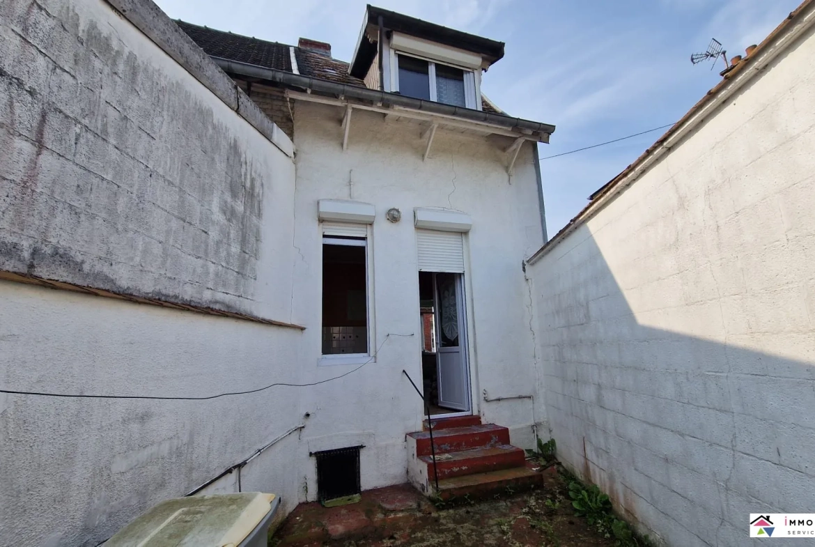 Maison de ville à rénover avec cour et dépendances à Frévent 