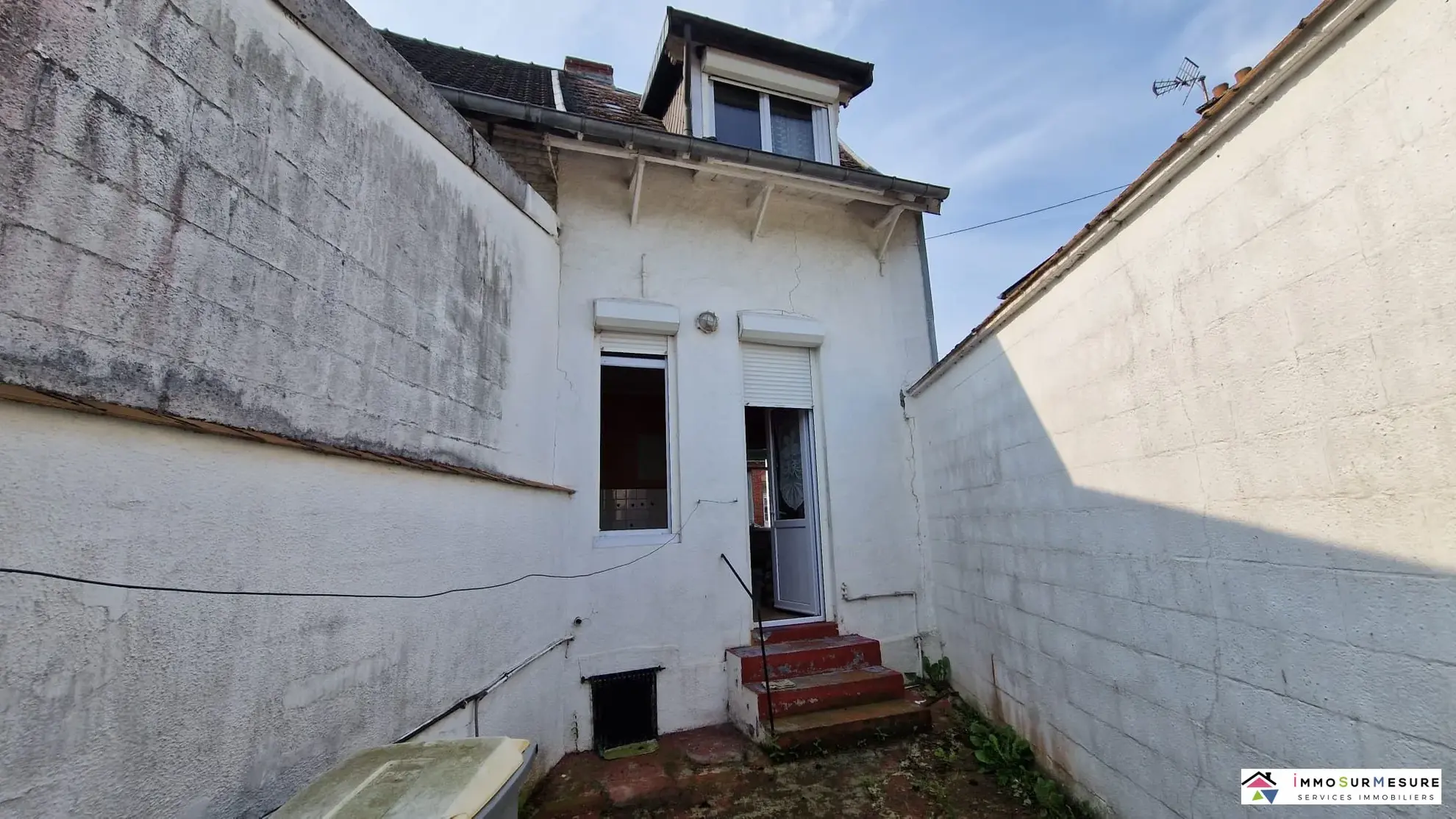 Maison de ville à rénover avec cour et dépendances à Frévent 