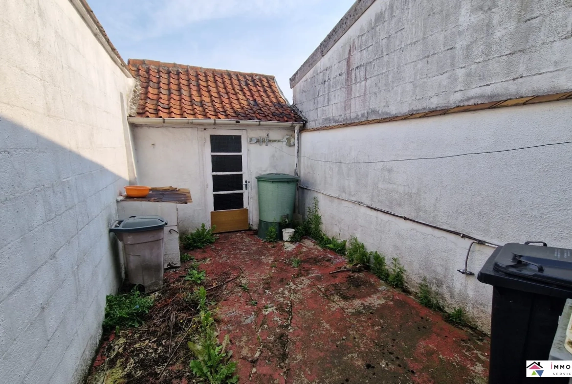 Maison de ville à rénover avec cour et dépendances à Frévent 