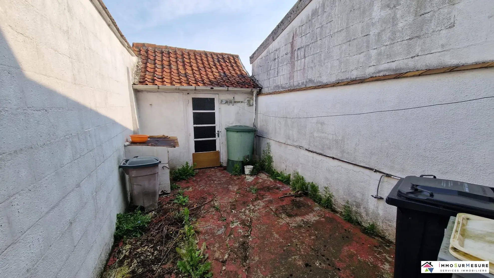 Maison de ville à rénover avec cour et dépendances à Frévent 