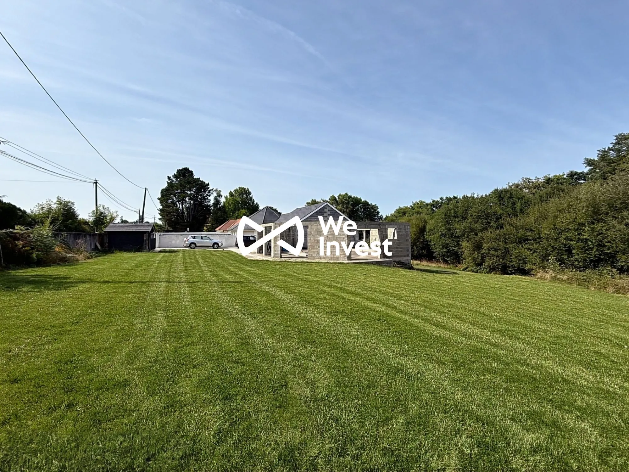 Maison en construction avec fort potentiel à Buros - Vue dégagée et terrain spacieux 