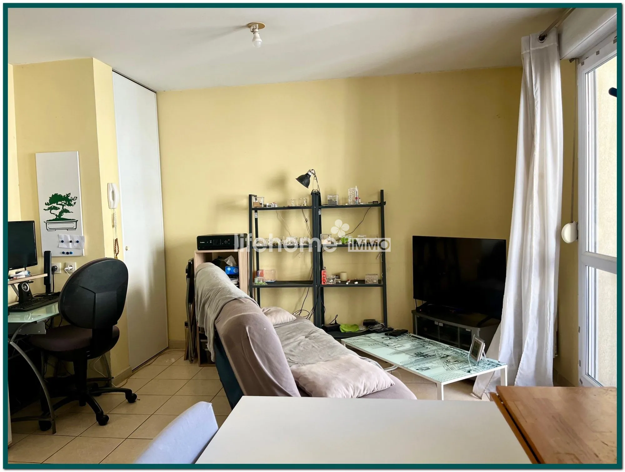 Bel appartement T1 bis loué à Nîmes avec terrasse et bonne rentabilité 