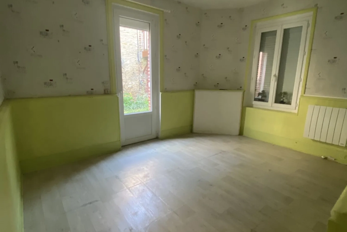 Maison à rénover avec dépendance et grand terrain à Mézidon-Canon 