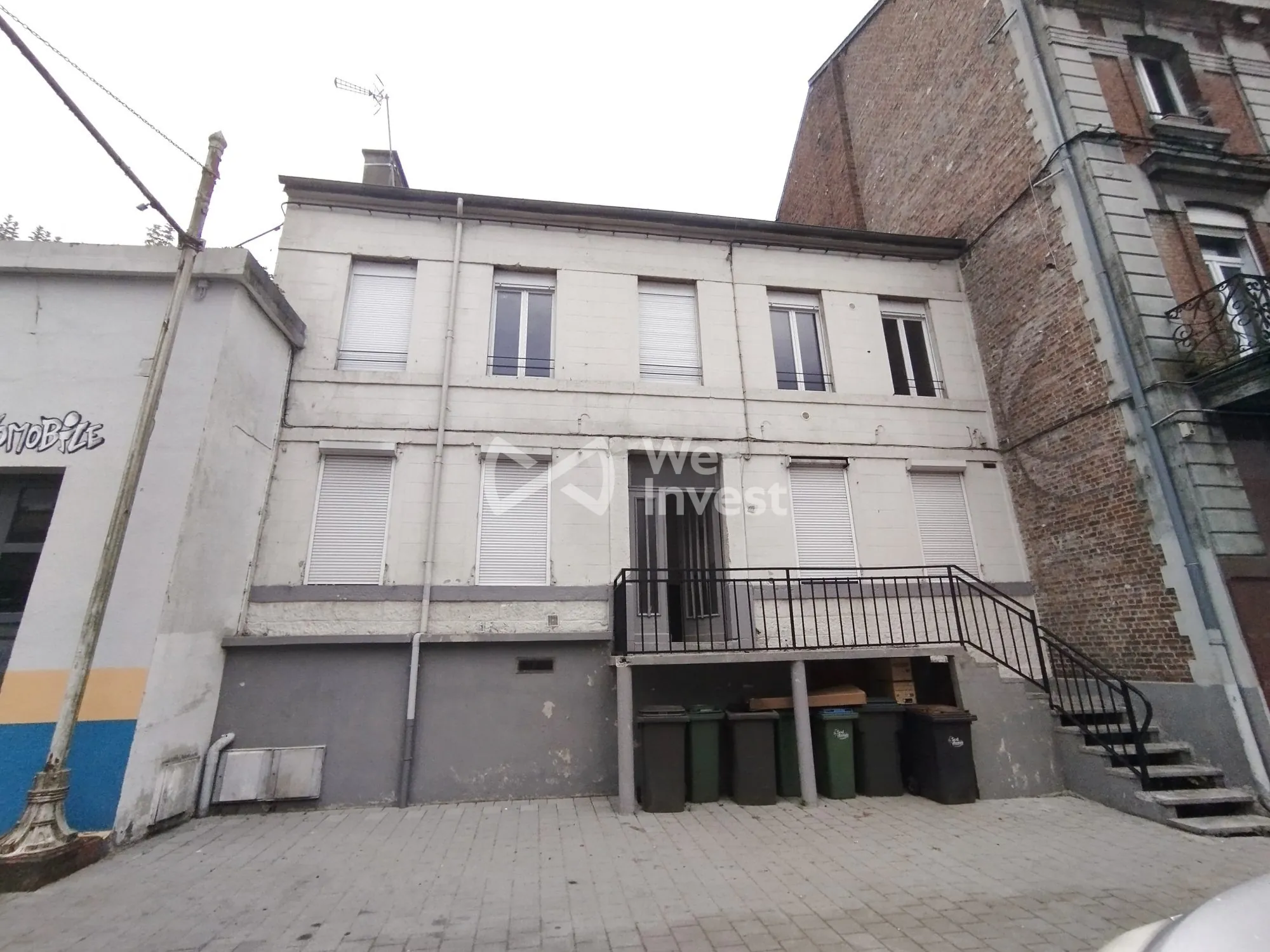 Investissement immobilier à Fourmies : immeuble de 2 appartements avec rapport locatif élevé 