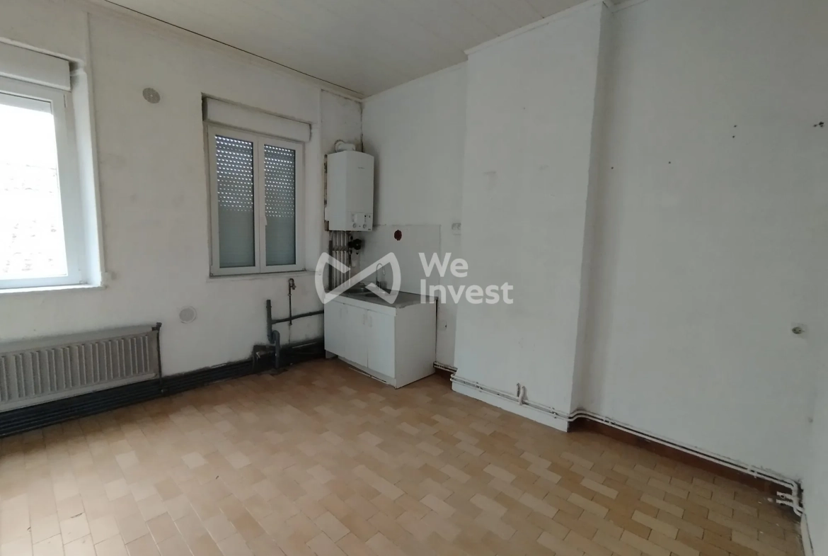 Investissement immobilier à Fourmies : immeuble de 2 appartements avec rapport locatif élevé 