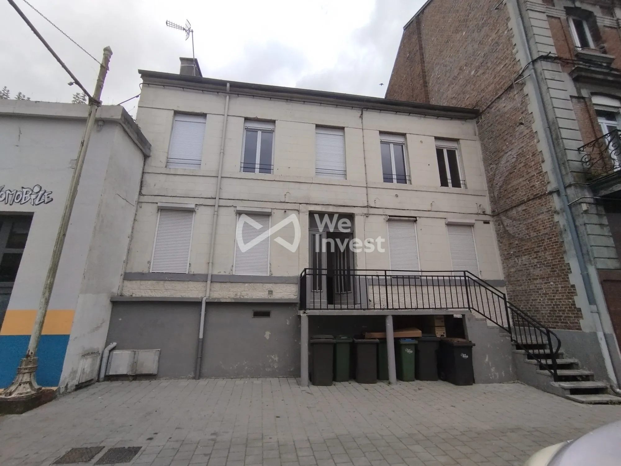 Investissement immobilier à Fourmies : immeuble de 2 appartements avec rapport locatif élevé 