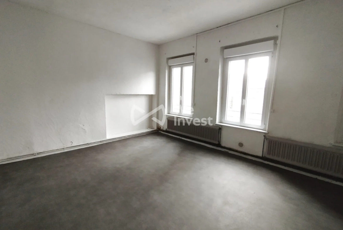 Investissement immobilier à Fourmies : immeuble de 2 appartements avec rapport locatif élevé 