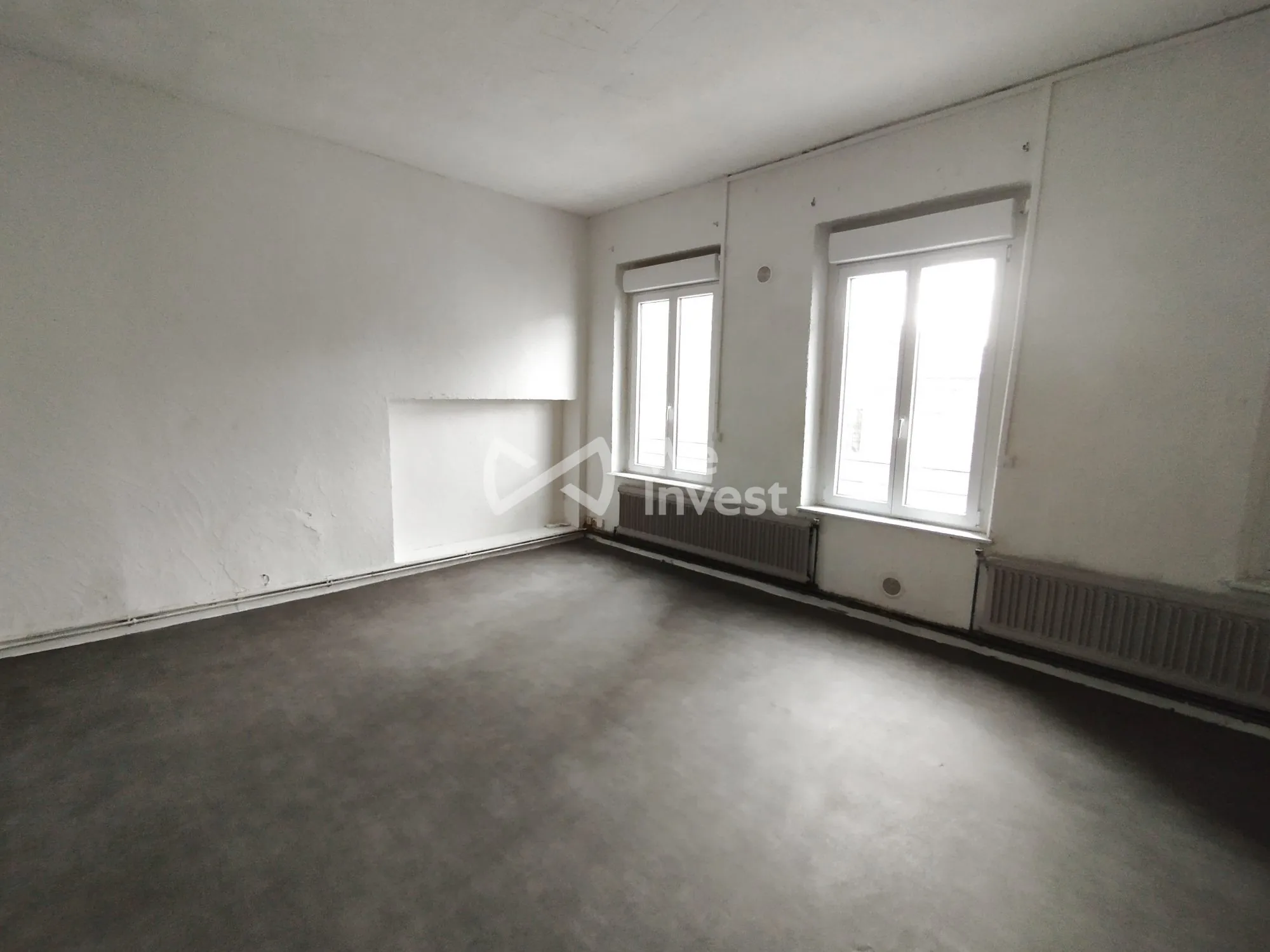 Investissement immobilier à Fourmies : immeuble de 2 appartements avec rapport locatif élevé 