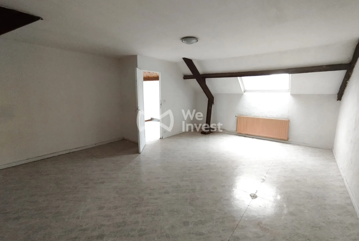 Investissement immobilier à Fourmies : immeuble de 2 appartements avec rapport locatif élevé 