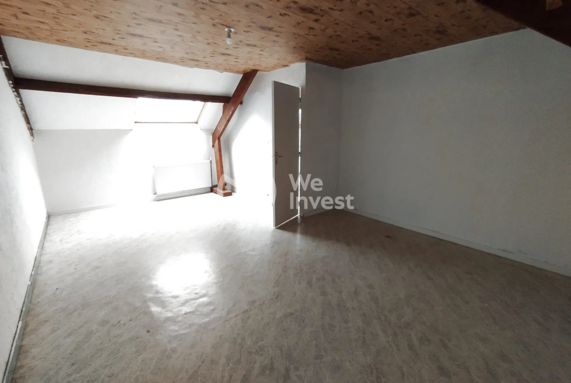 Investissement immobilier à Fourmies : immeuble de 2 appartements avec rapport locatif élevé 