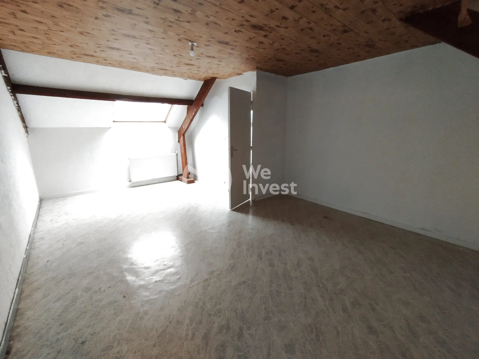 Investissement immobilier à Fourmies : immeuble de 2 appartements avec rapport locatif élevé 