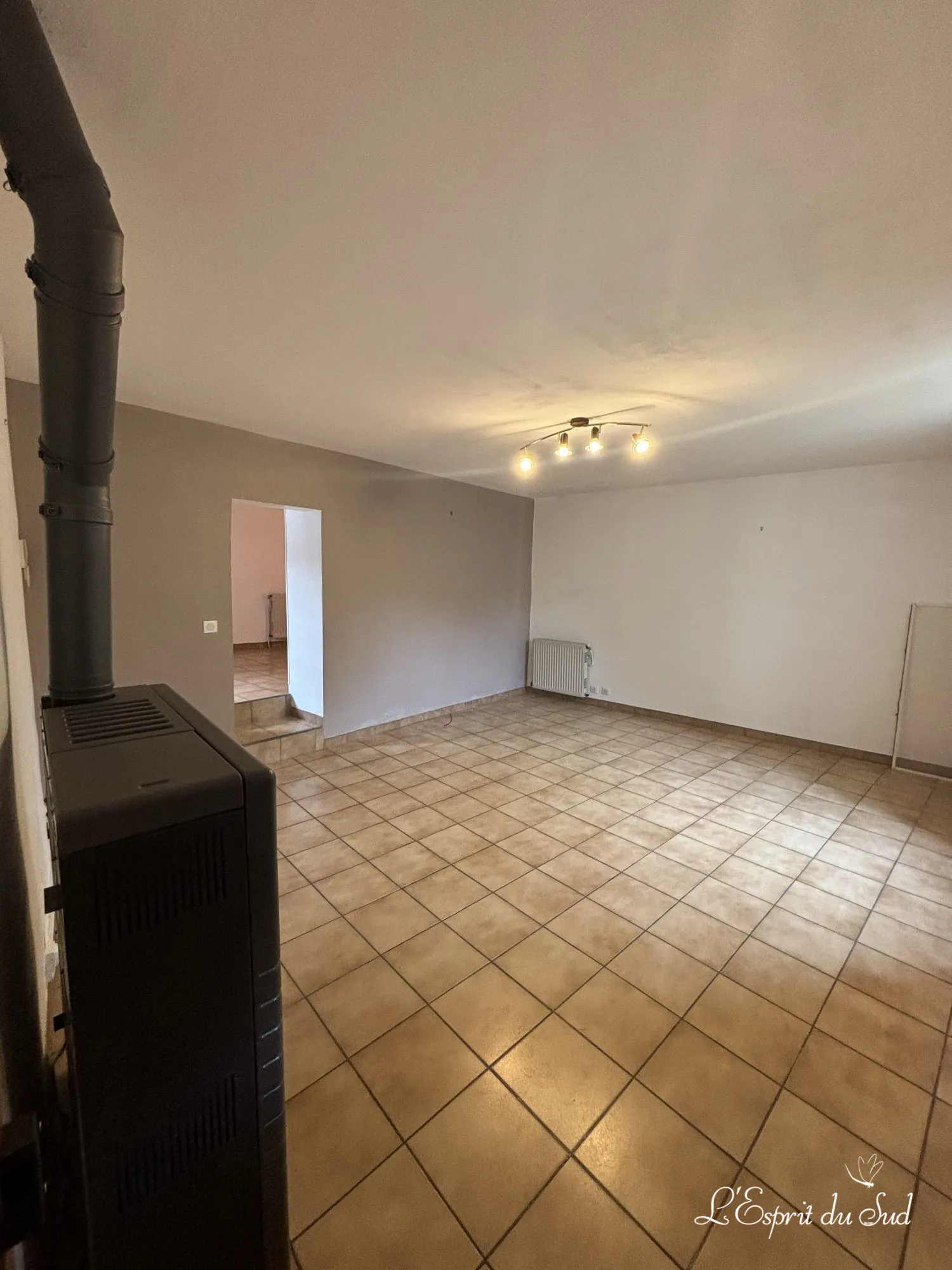 Salon avec poele Maison de village en pierre de 162 m² avec terrain à Campagnac, Gaillac à vendre 
