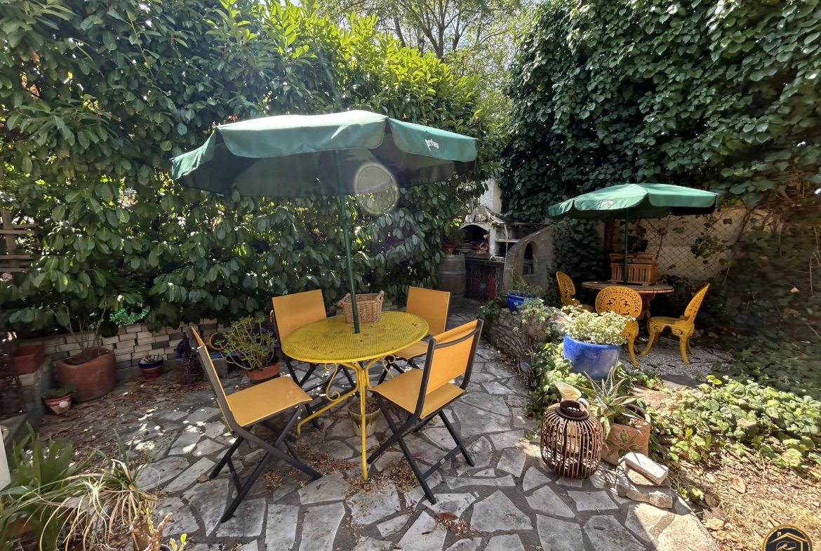 Charmante maison de ville à vendre avec jardin et garage à Carcassonne 
