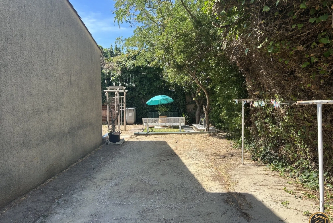Charmante maison de ville à vendre avec jardin et garage à Carcassonne 