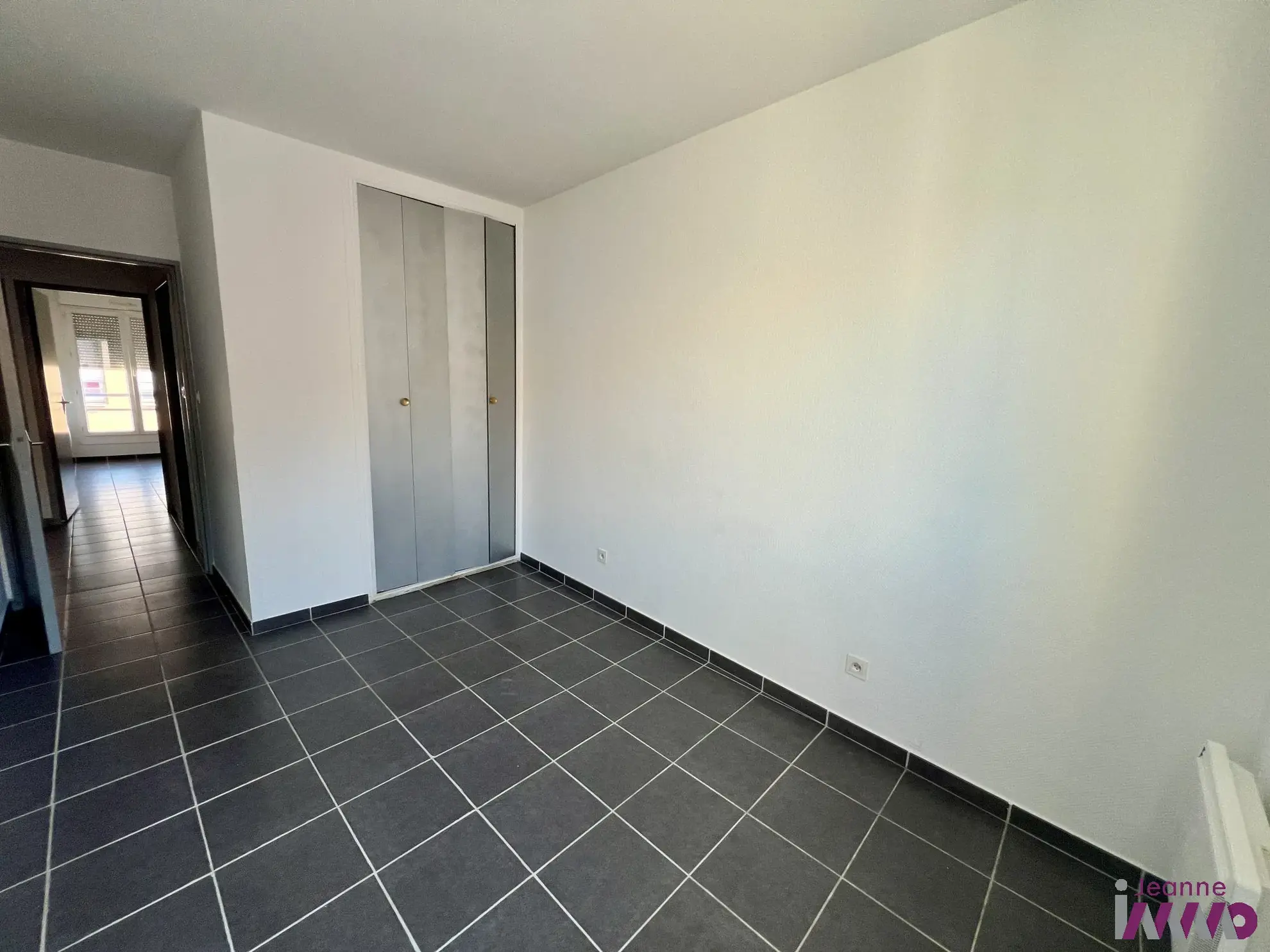 Appartement à vendre à Belfort - 3 chambres, balcon et parking au dernier étage 