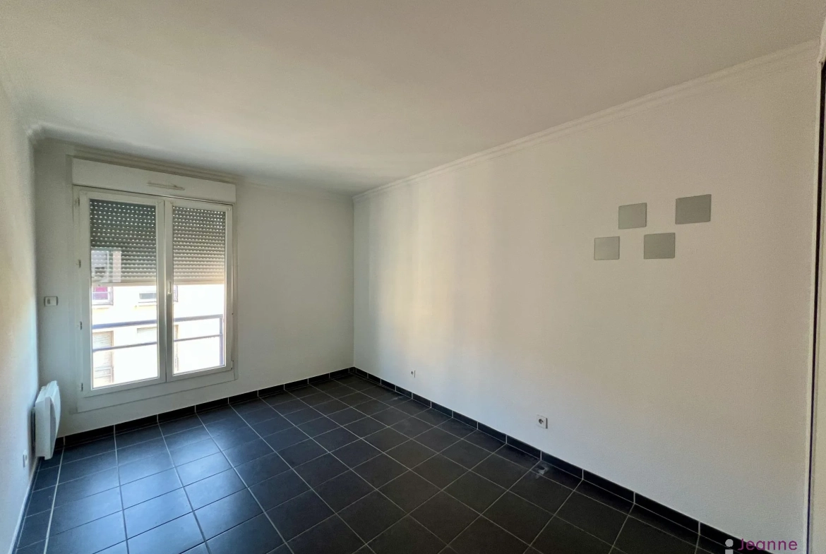 Appartement à vendre à Belfort - 3 chambres, balcon et parking au dernier étage 