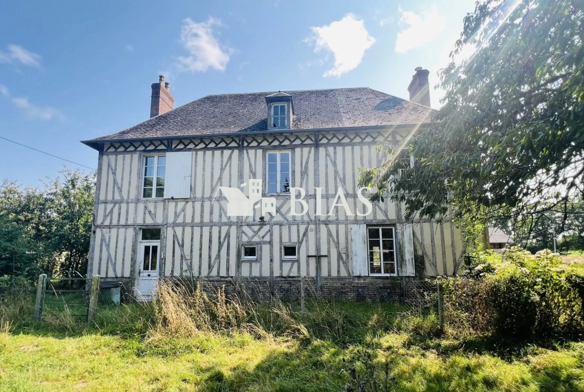 Ancien corps de ferme en briques à restaurer à Bernay avec grand terrain 
