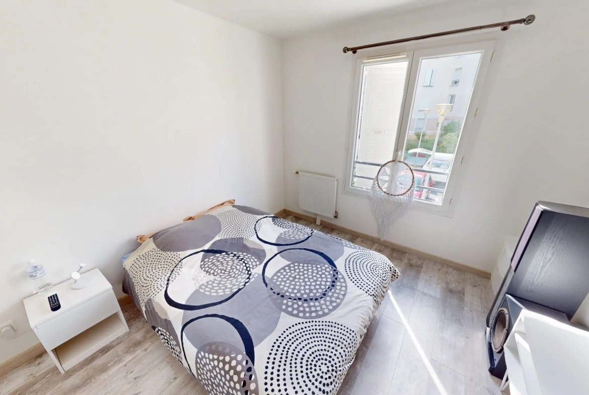 Appartement lumineux de 56 m² avec balcon, cave et stationnements à Orléans 