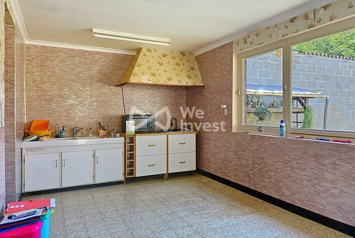 Maison à vendre à Berlaimont – 4 chambres, jardin, garage, potentiel de rénovation 
