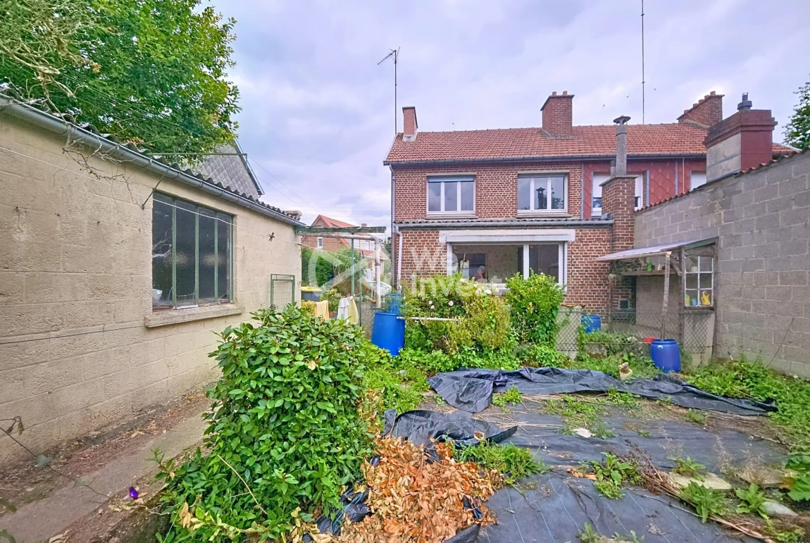 Maison à vendre à Berlaimont – 4 chambres, jardin, garage, potentiel de rénovation 