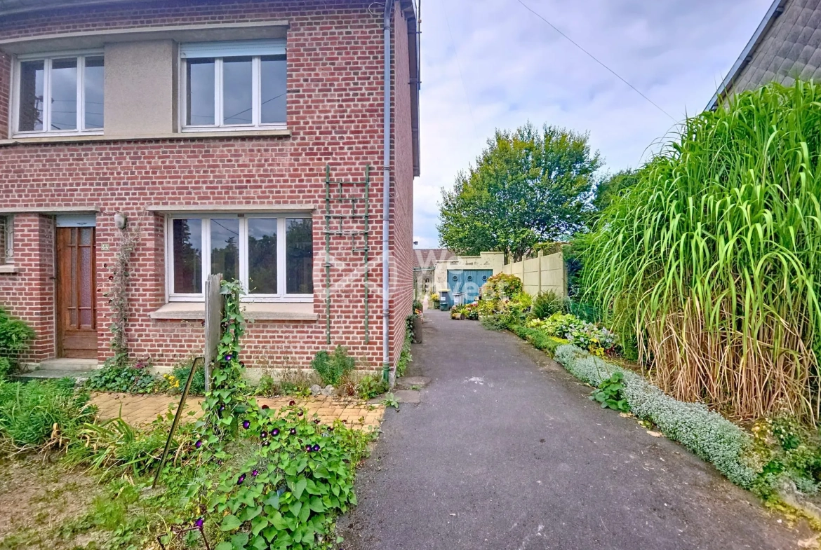 Maison à vendre à Berlaimont – 4 chambres, jardin, garage, potentiel de rénovation 