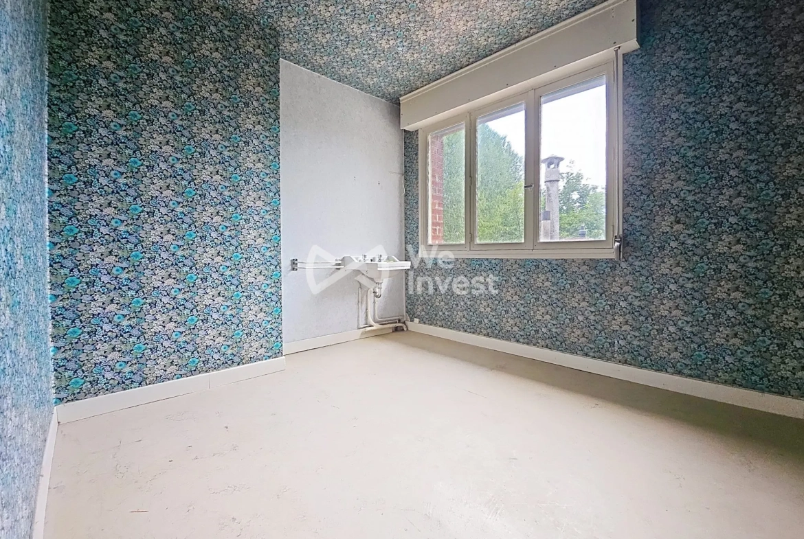 Maison à vendre à Berlaimont – 4 chambres, jardin, garage, potentiel de rénovation 