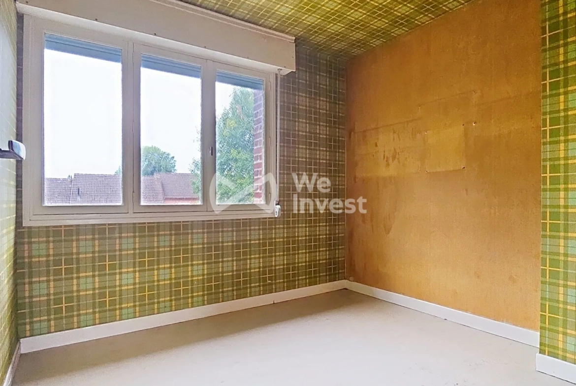 Maison à vendre à Berlaimont – 4 chambres, jardin, garage, potentiel de rénovation 