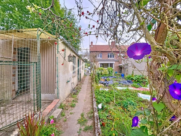 Maison à vendre à Berlaimont – 4 chambres, jardin, garage, potentiel de rénovation