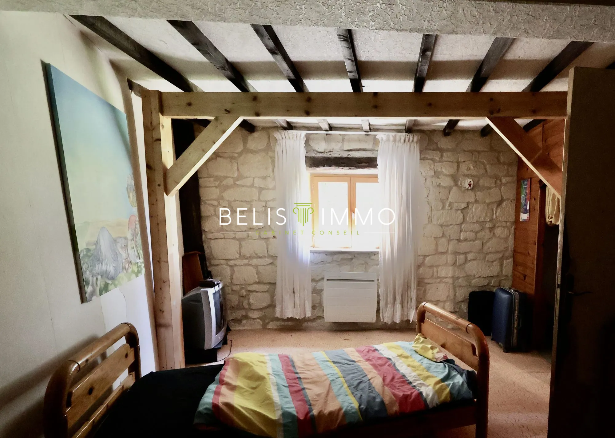 Maison en pierres à vendre avec vue panoramique sur la vallée de la Vienne près de Chinon 