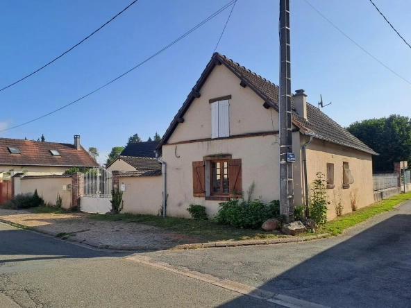 Ensemble immobilier à Saint-Piat avec deux maisons et jardin privé