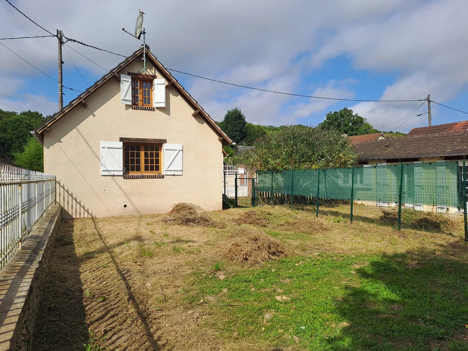 Ensemble immobilier à Saint-Piat avec deux maisons et jardin privé 