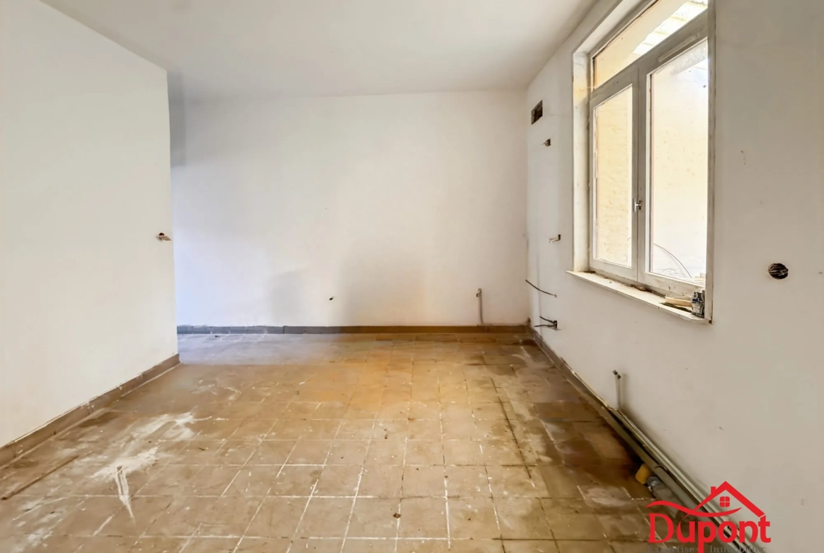 Maison à Rénover de 62 m² à Cambrai avec Cave et Petit Extérieur 